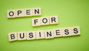 Tiles spelling out phrase 'Open for Business'